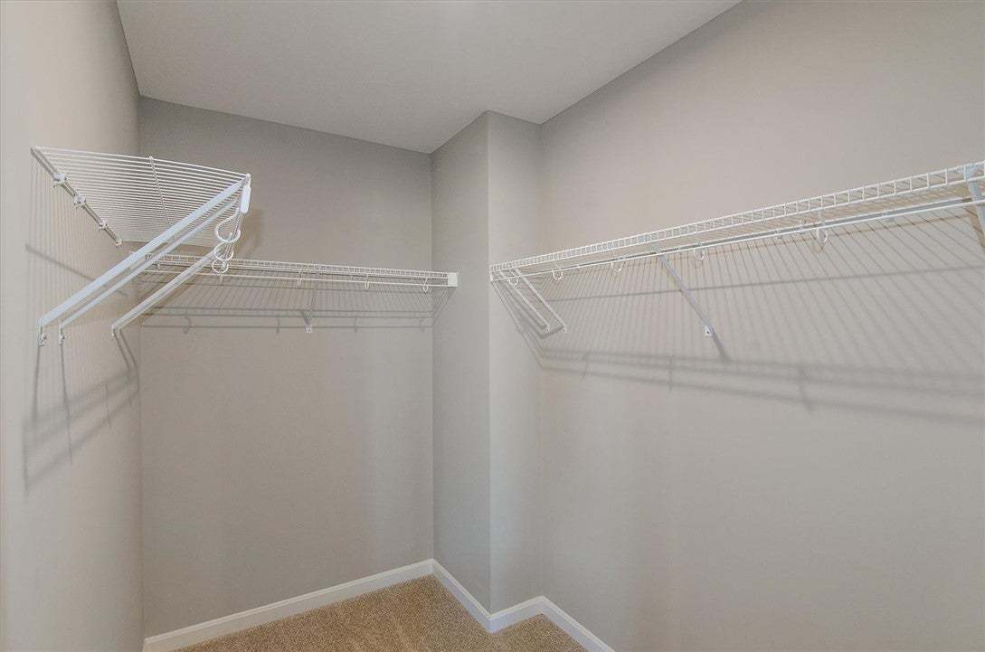 Ample wire shelving lines this functional closet s
