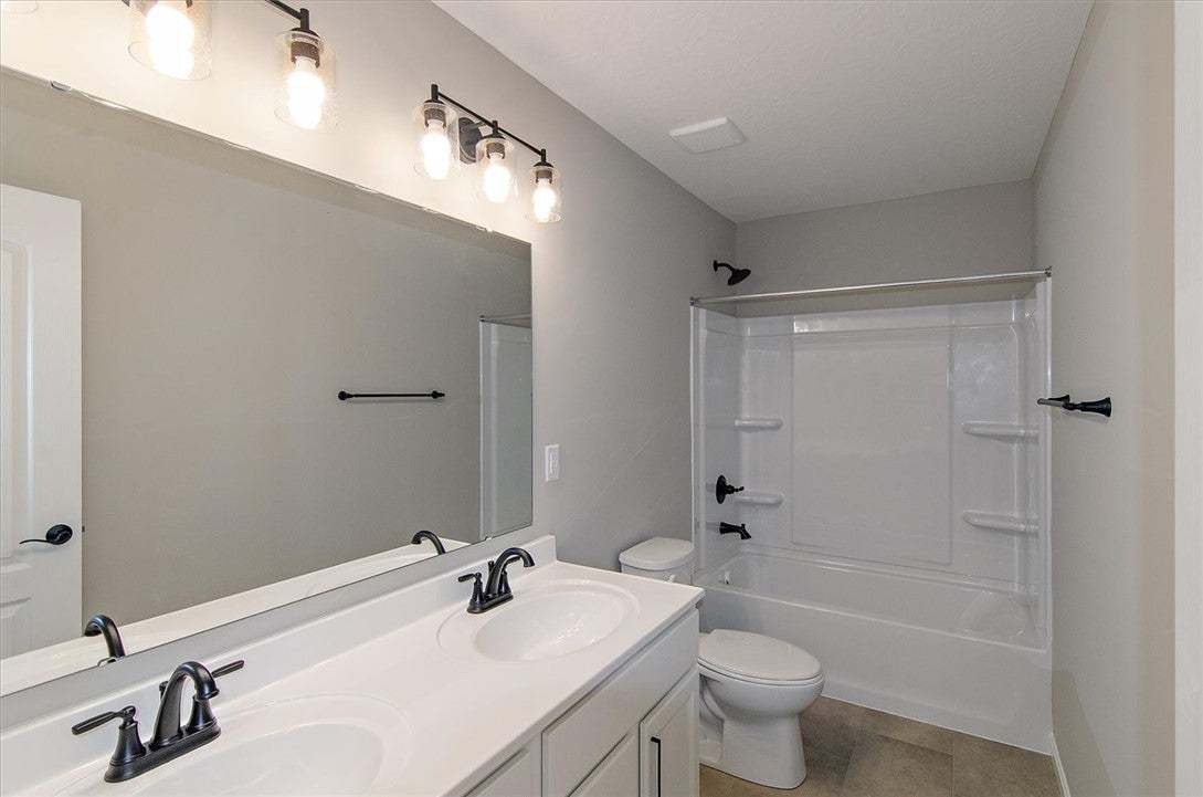 Clean lines and dual sinks define this contemporar