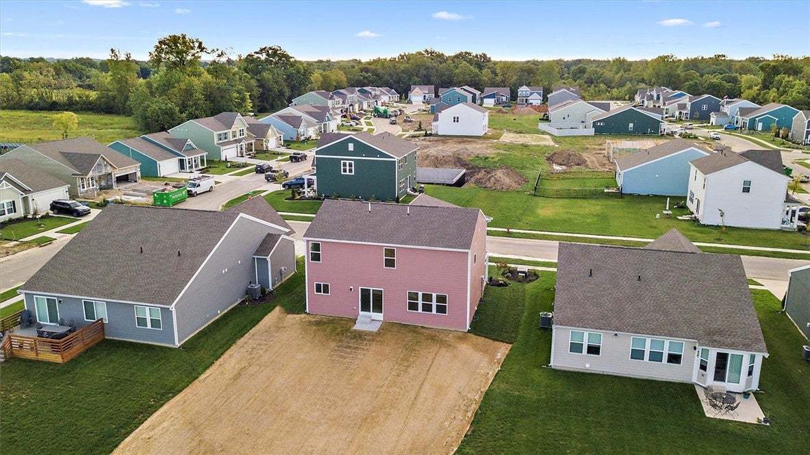 A quiet suburban neighborhood showcases newly cons