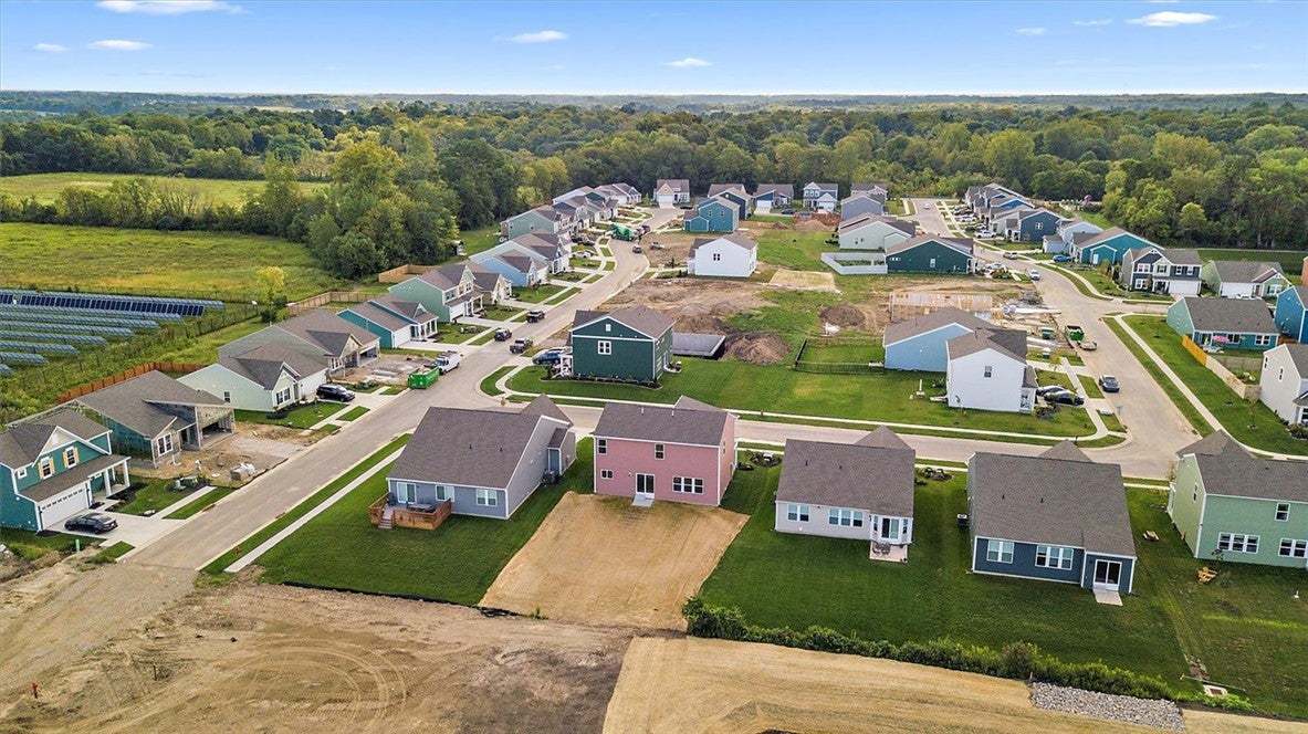 An aerial perspective showcases a modern suburban