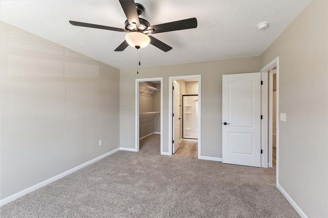 Soft carpeting pairs with neutral walls in this be