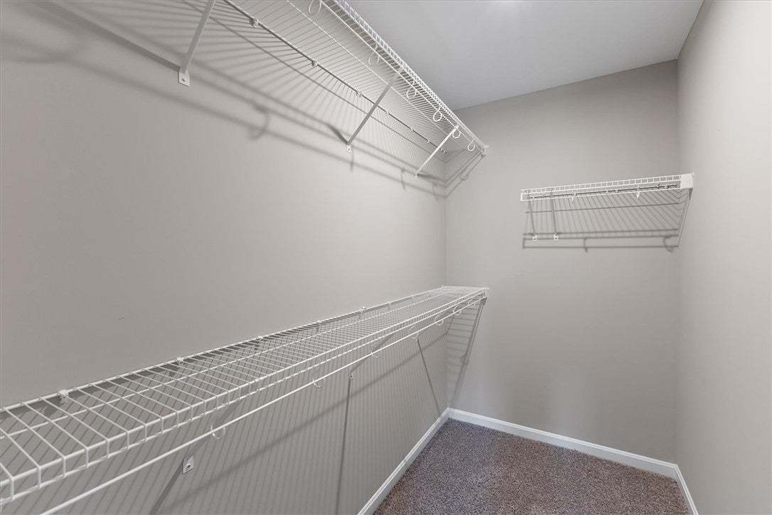 Ample wire shelving lines this functional closet s