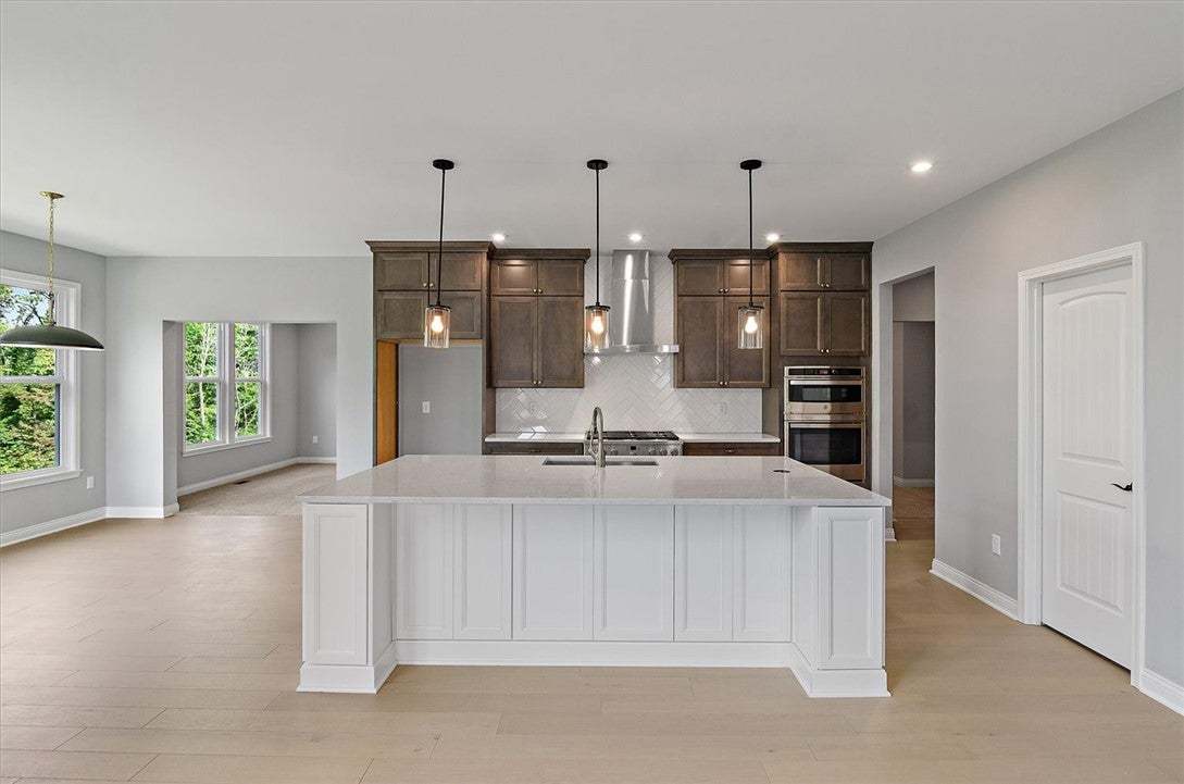 Gleaming hardwood floors and a spacious central is