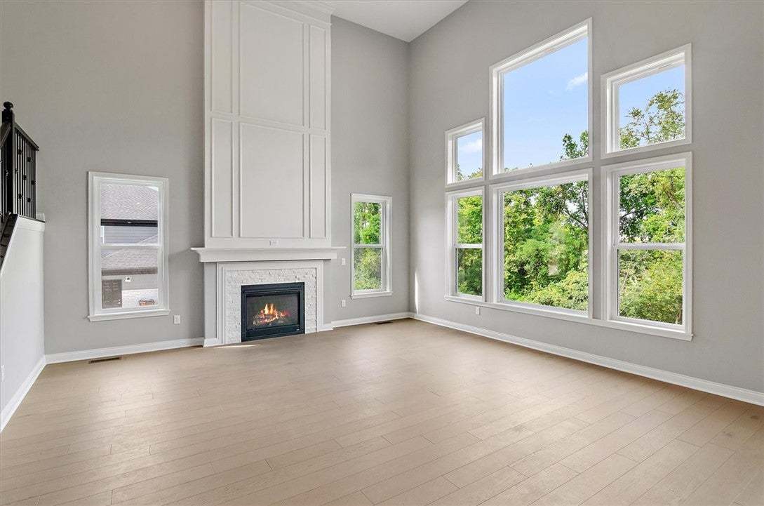 Soaring ceilings and massive windows fill the fire