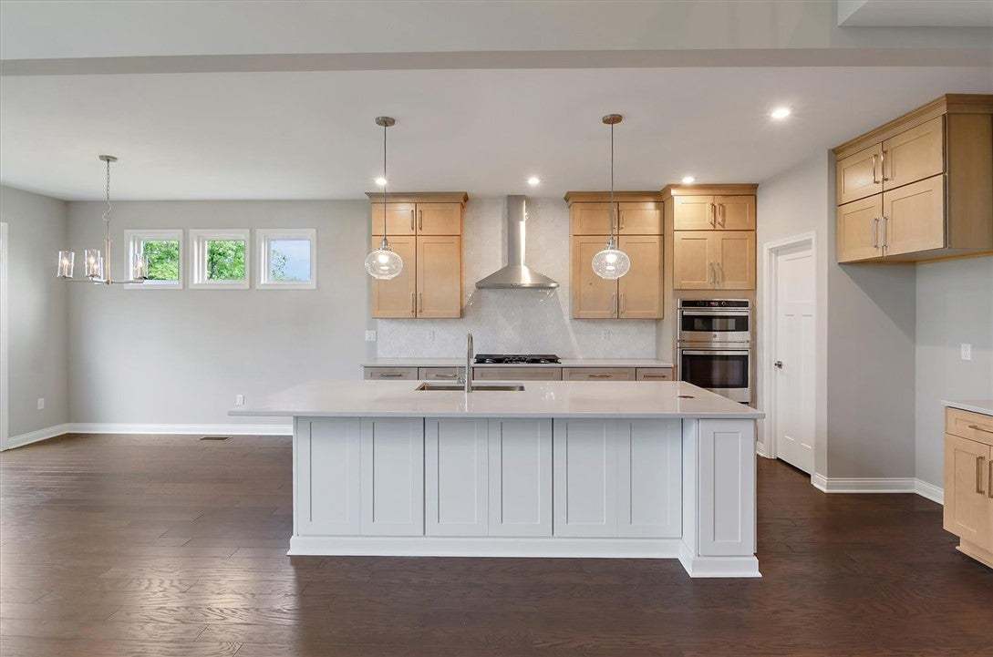 Gleaming hardwood floors and a spacious central is
