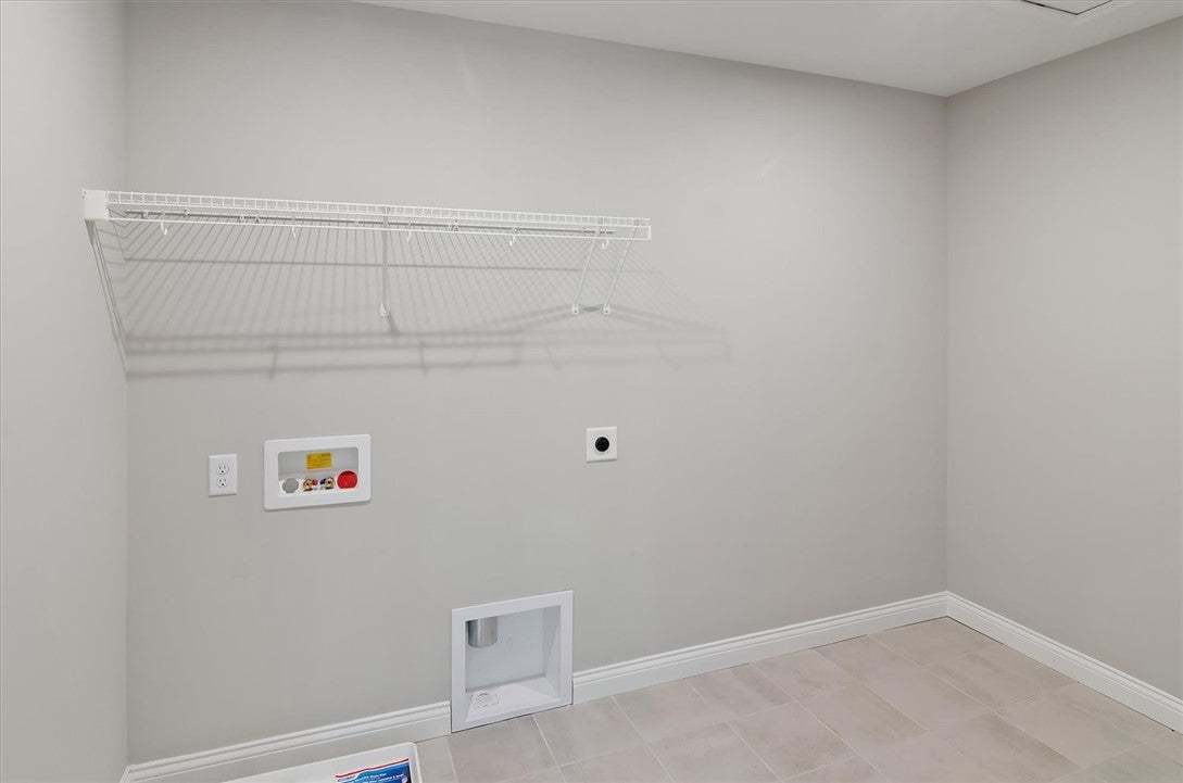 A dedicated utility space with durable tile floori