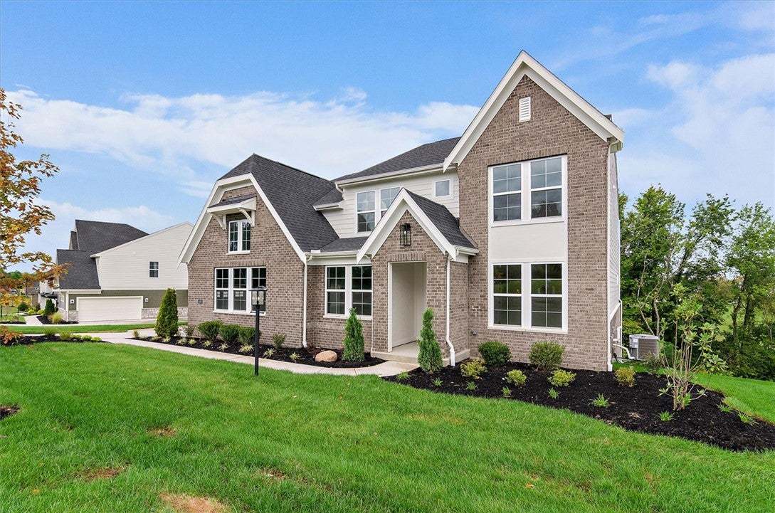 Elegant brick craftsmanship highlights the exterio
