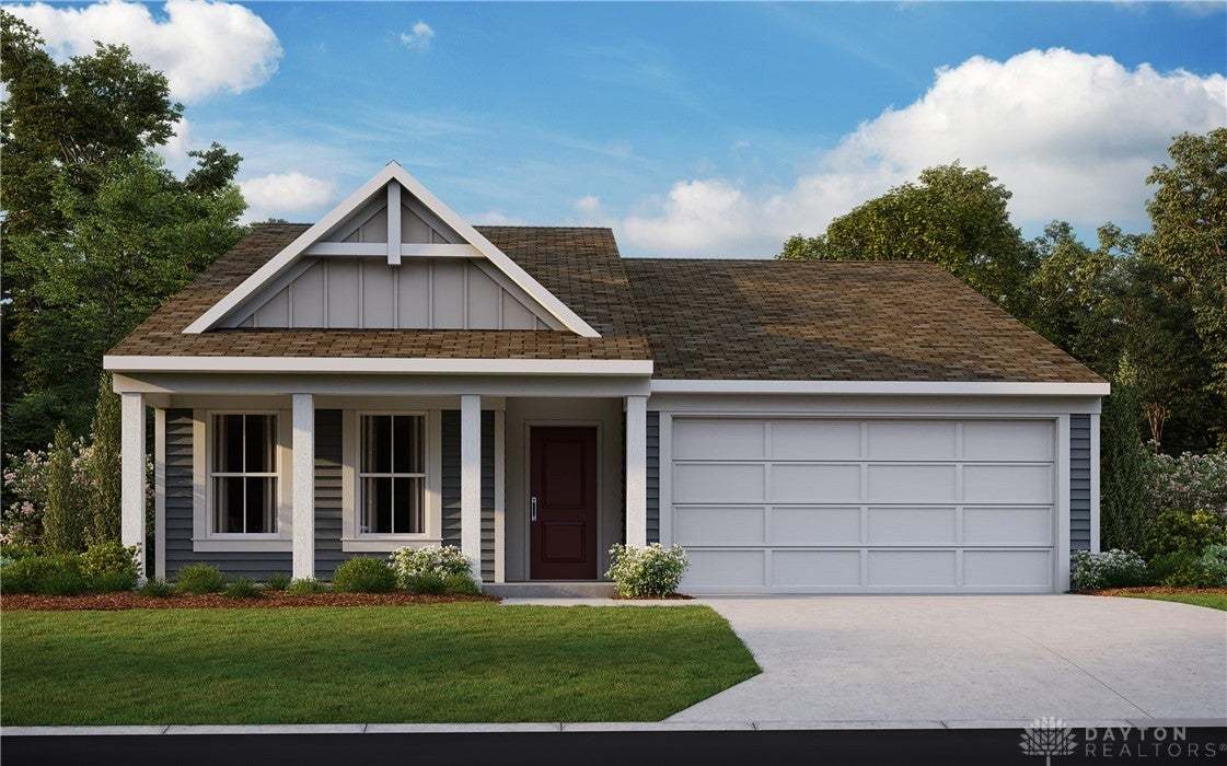 A welcoming facade features a prominent gable, inv