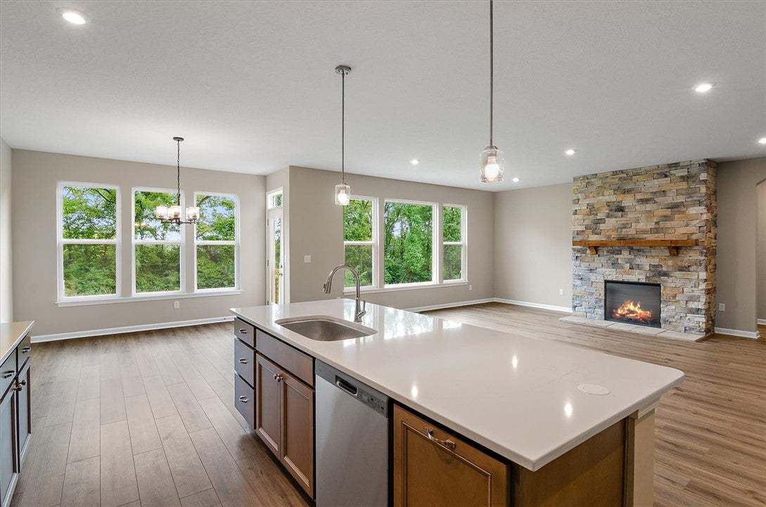 An open floor plan connects the kitchen island to