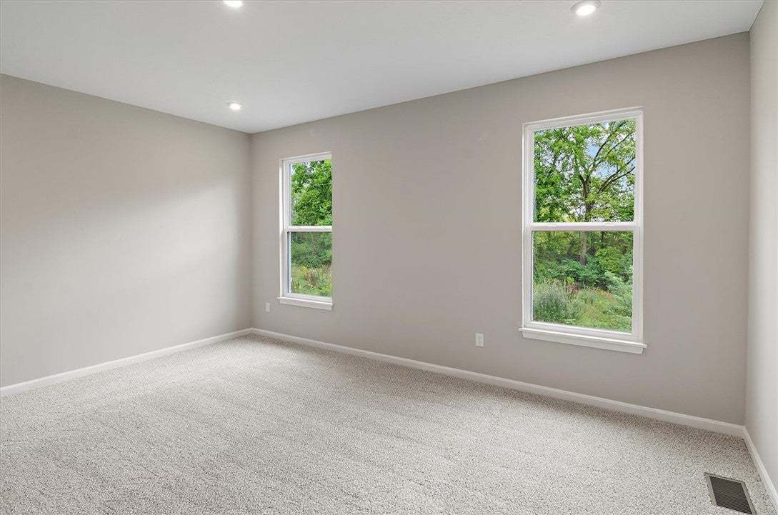 Natural light fills this quiet space through large