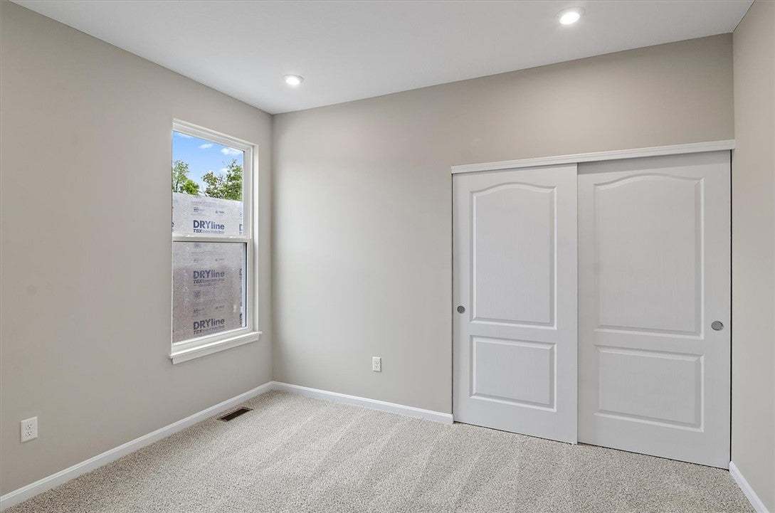 Recessed lighting illuminates this quiet room feat