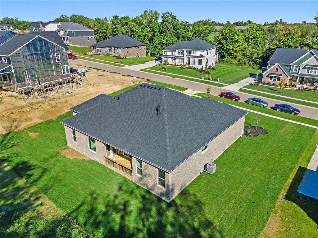 An aerial perspective showcases the stone facade,