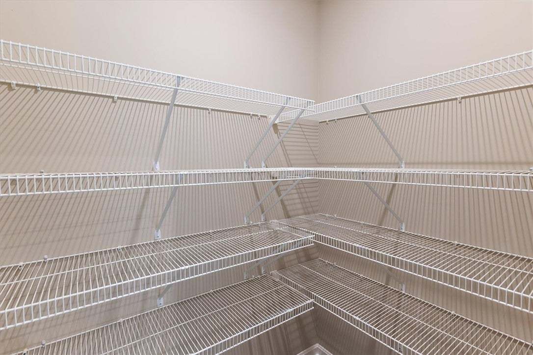 Ample wire shelving lines this functional storage