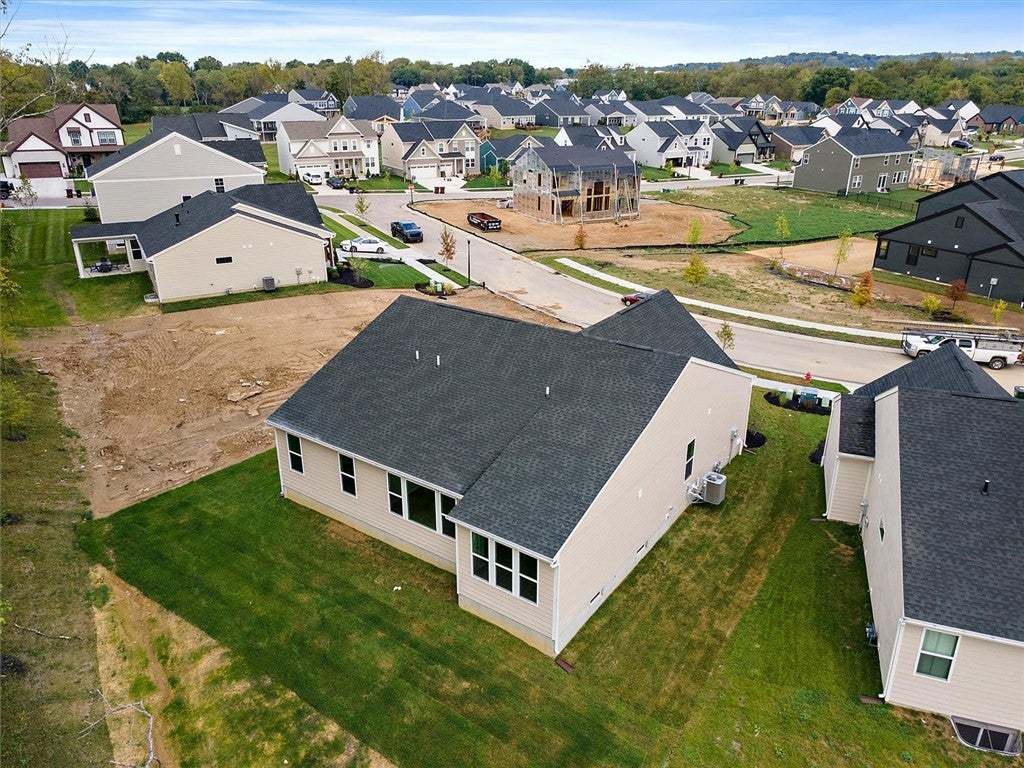 An aerial perspective showcases a modern suburban