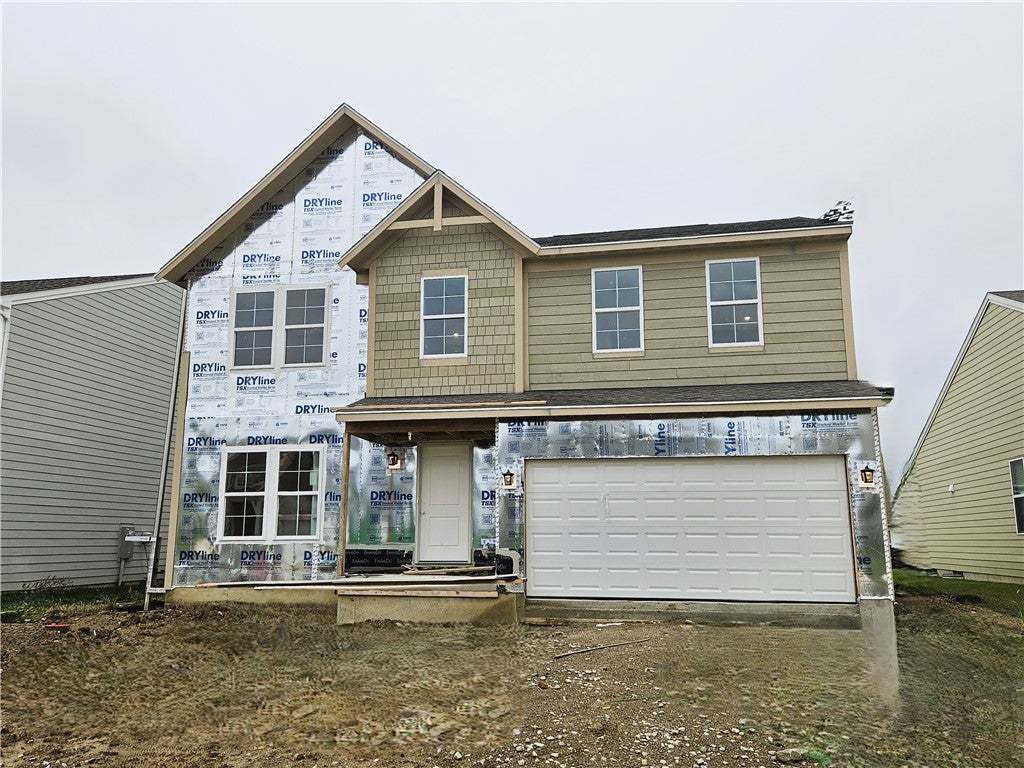 A classic two-story layout features a prominent do
