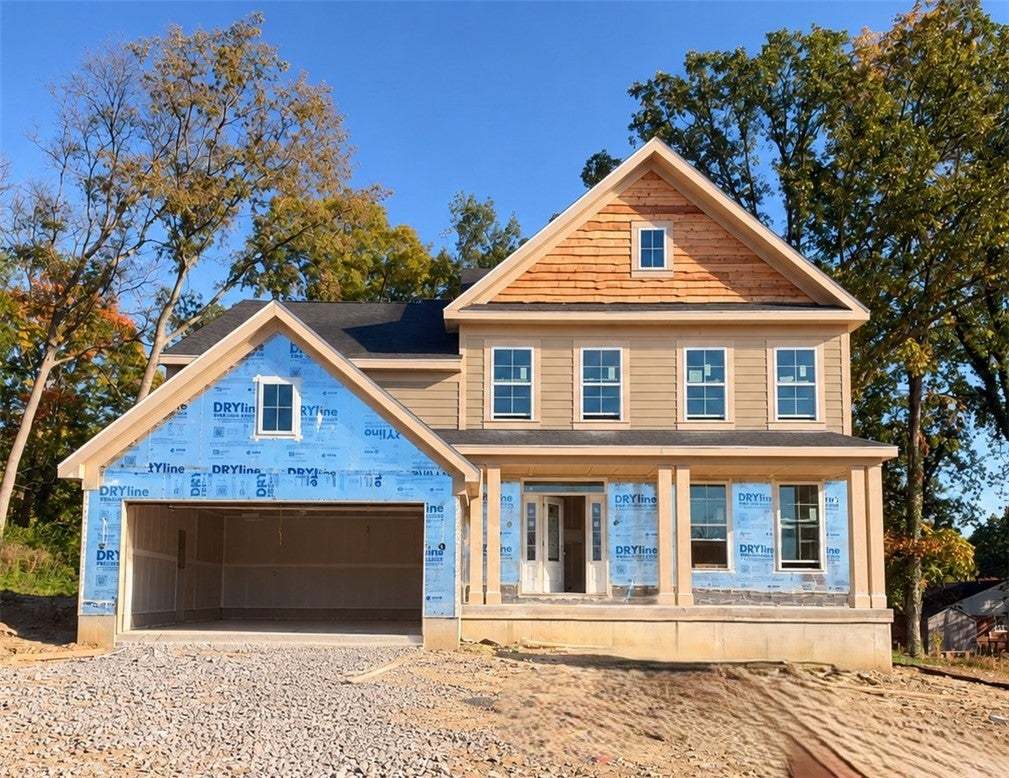 A classic facade showcasing multi-textured siding