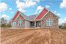 casa en Front Porch Custom Builders por Front Porch Custom Builders