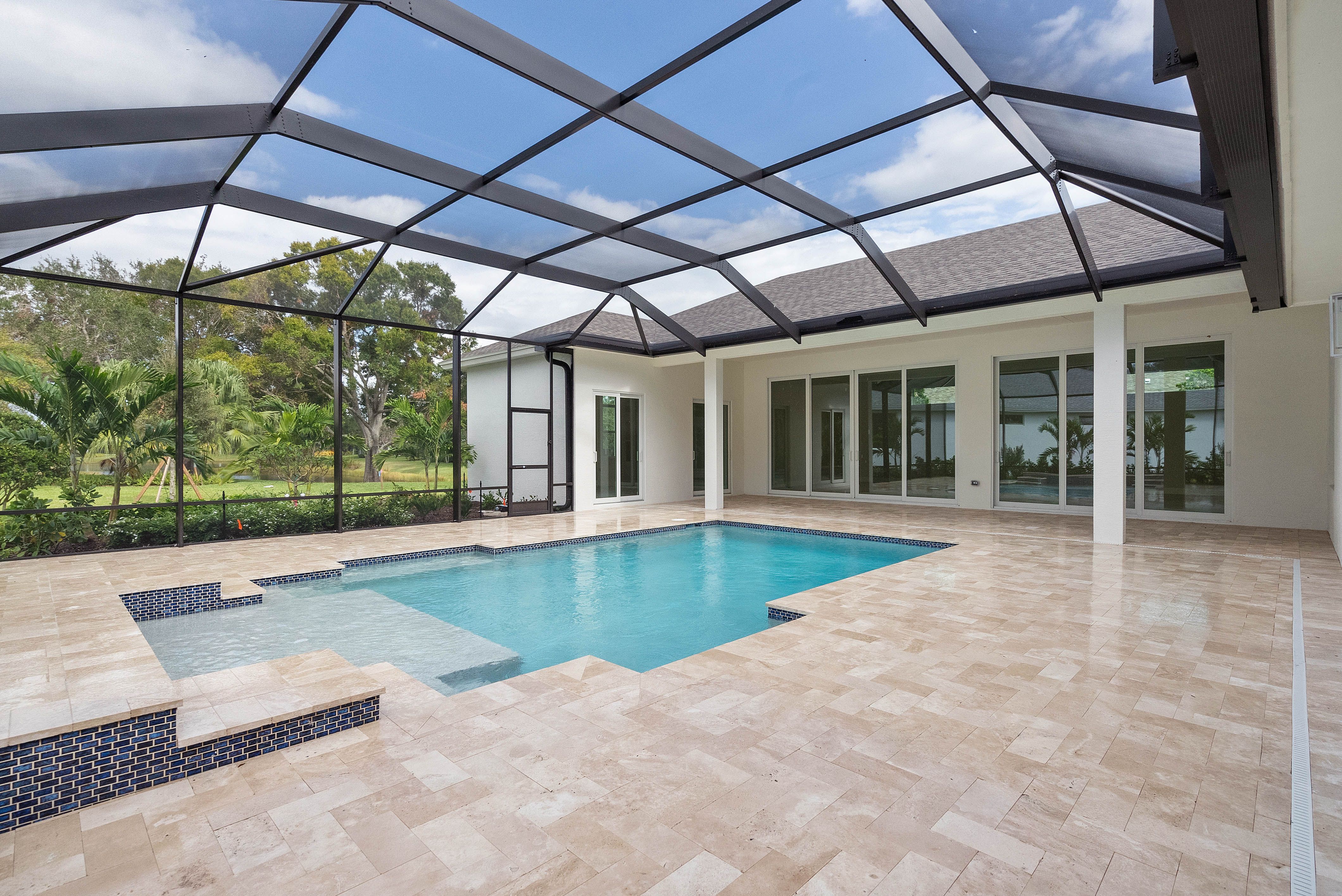 Screened Pool & Pool Deck | 236 Oak Hammock Cr SW