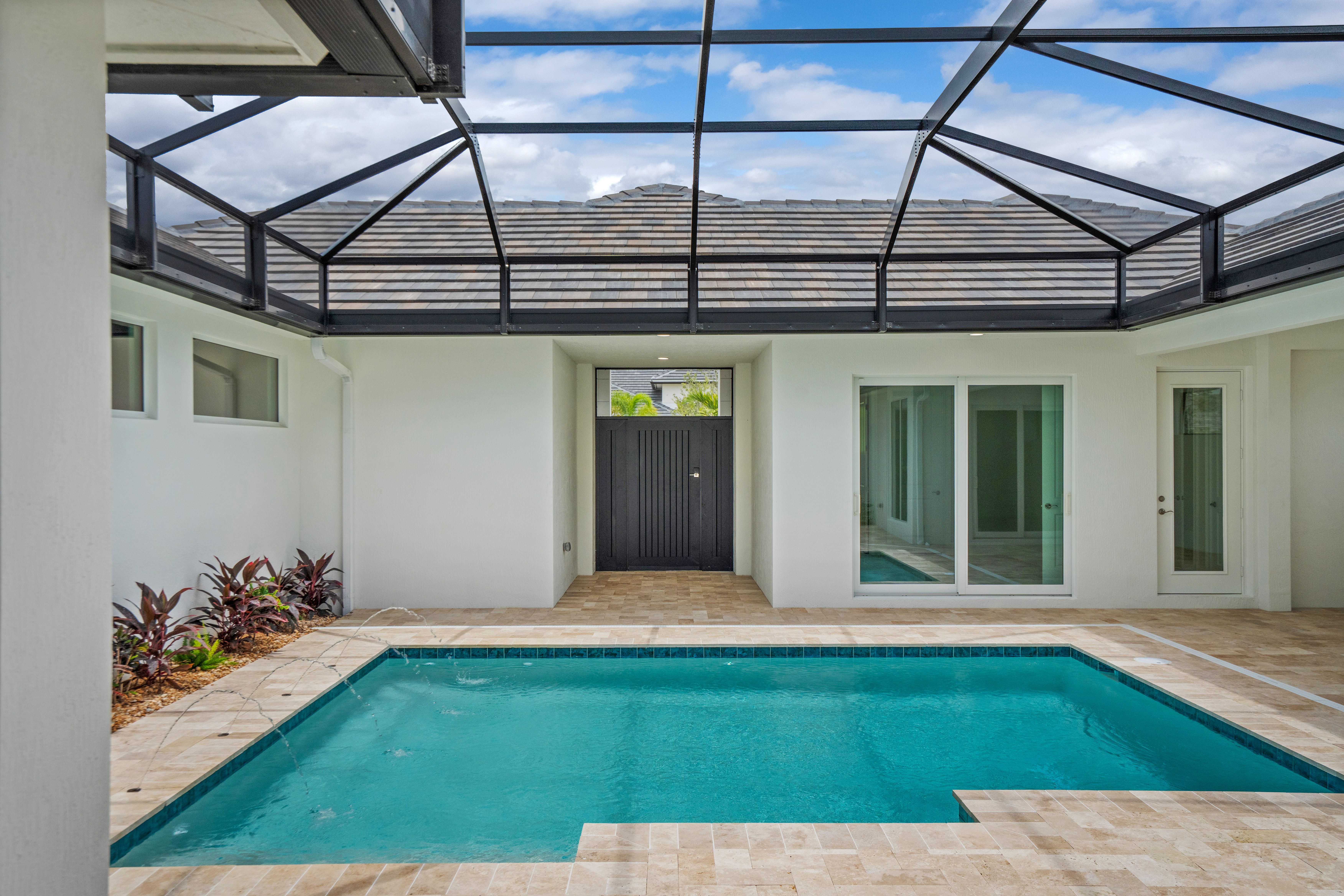 Screened Pool Courtyard | 14196 SW Pinnacle Ct