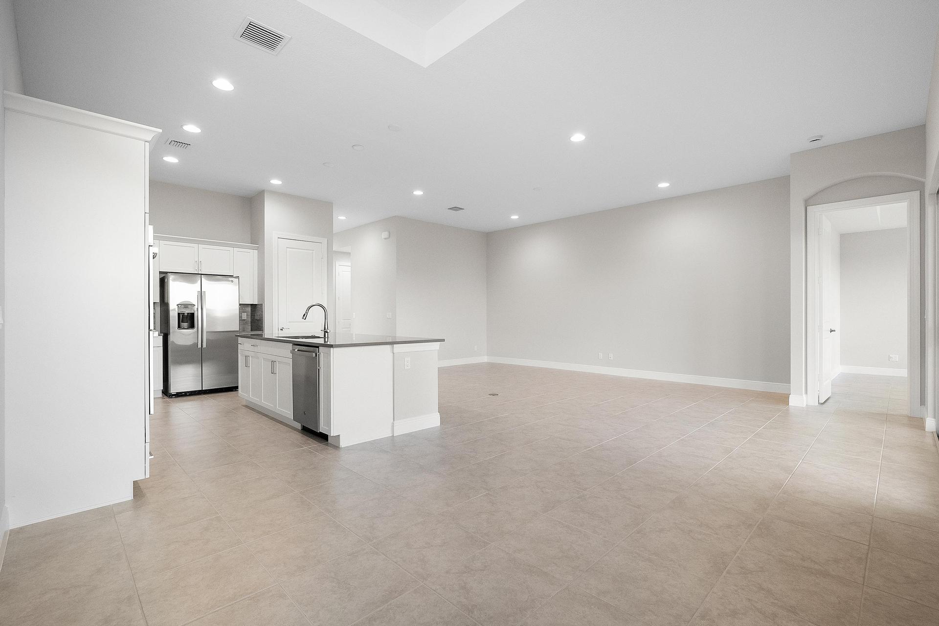 Dining to Great Room and Kitchen | 12507 SW Sunrise Lake Terrace