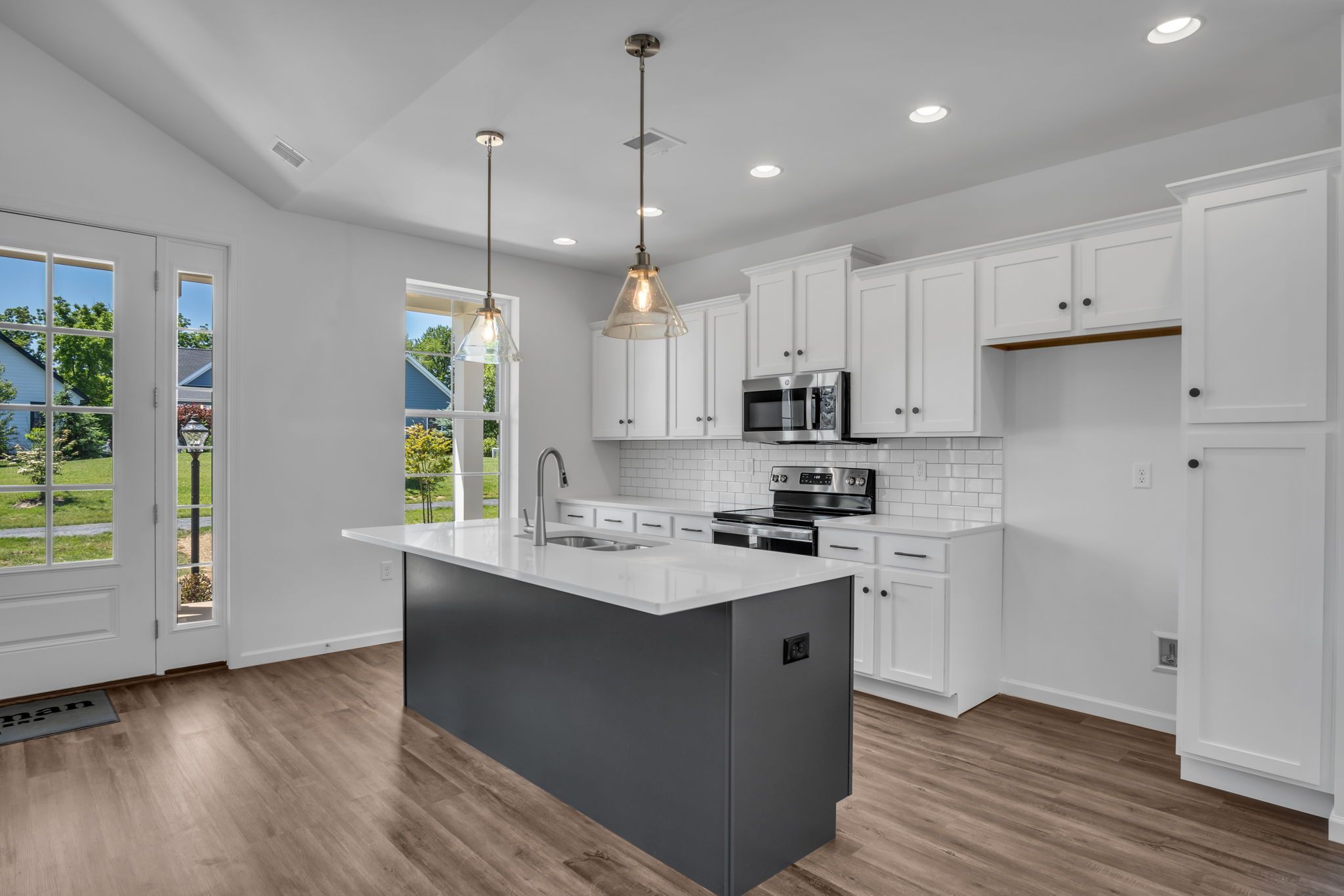 Kitchen with Center Island of the Tippet Model from Garman Builders