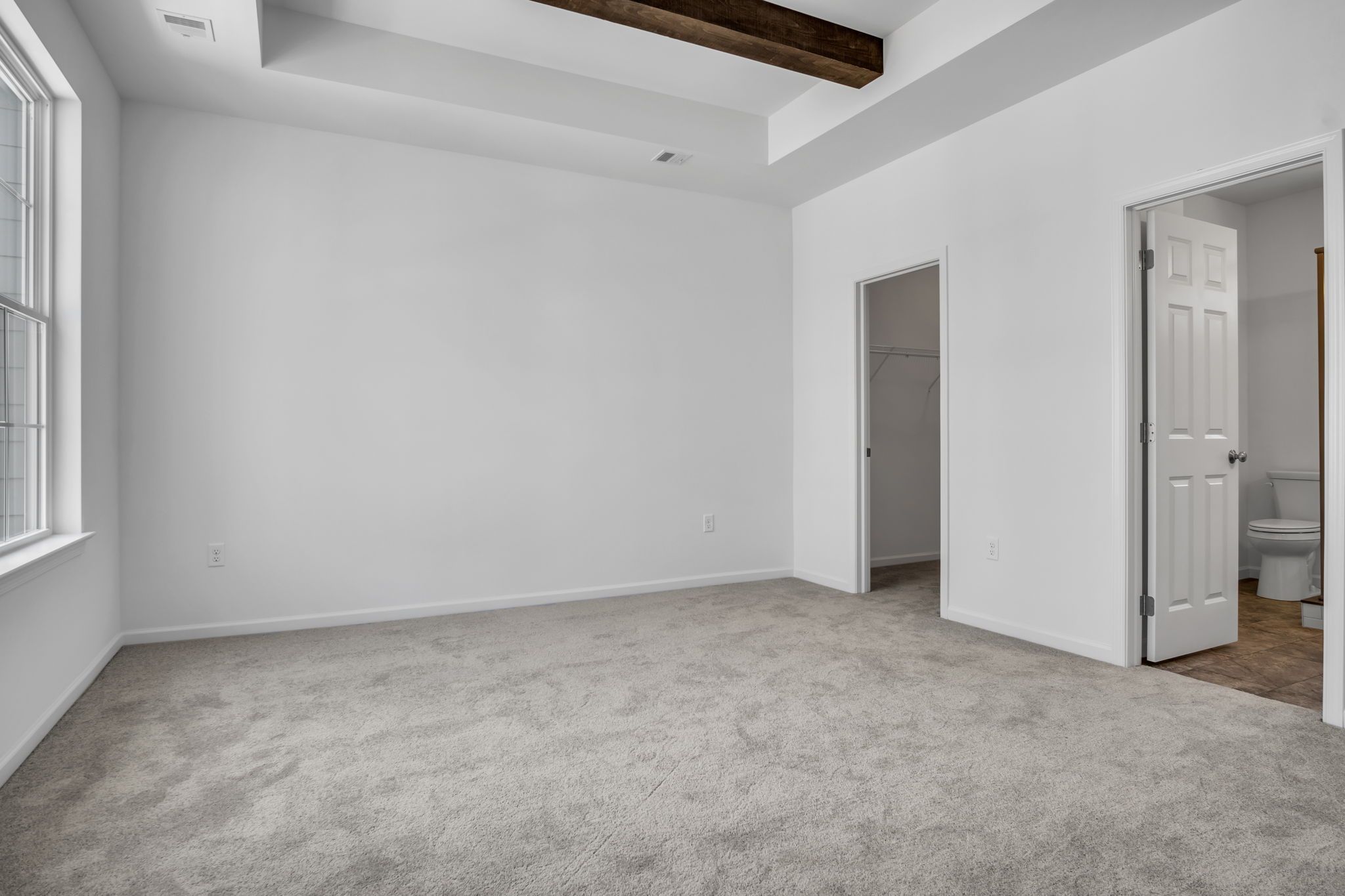 Empty Bedroom of the Tippet Model from Garman Builders