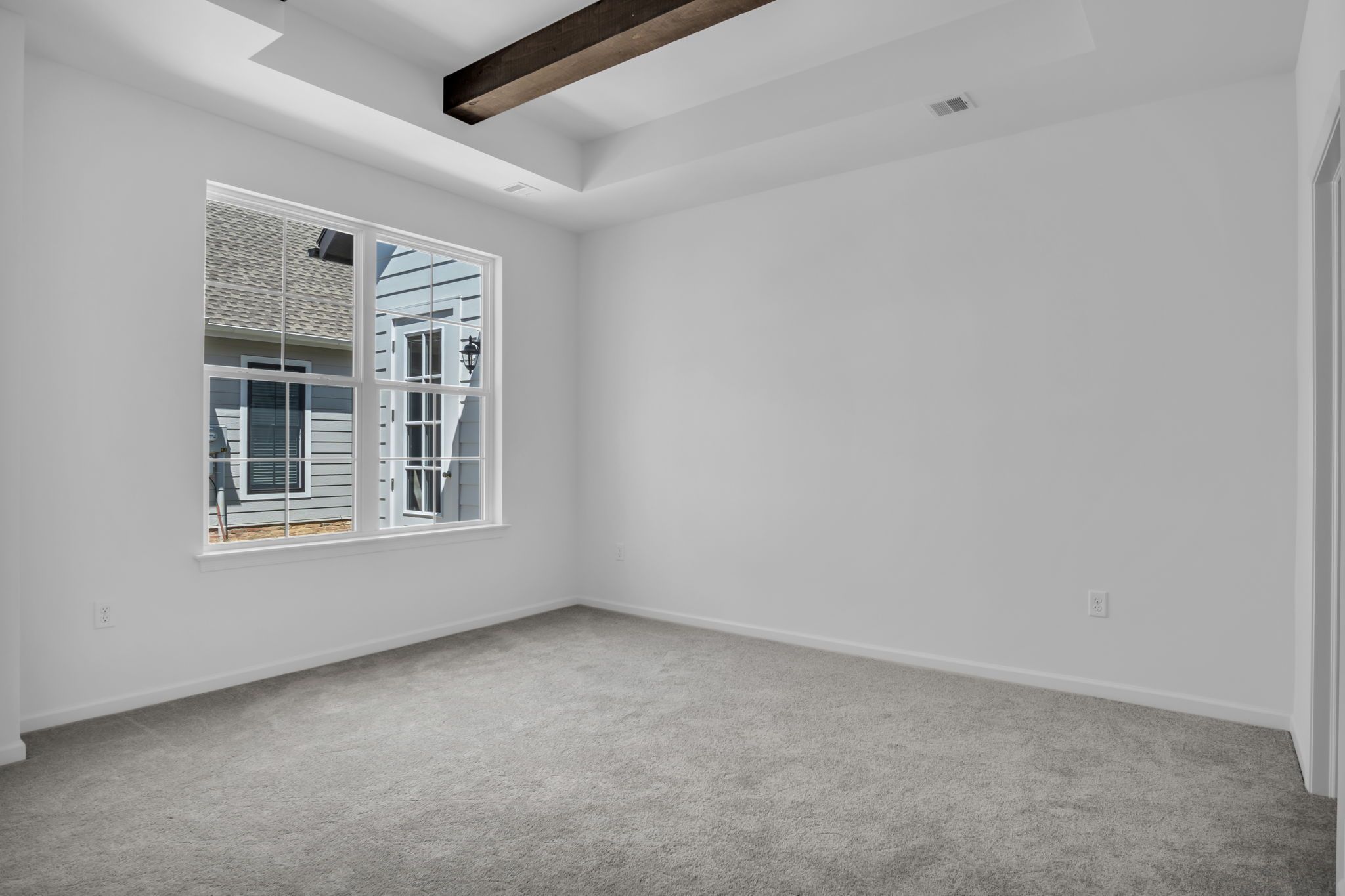 Empty Bedroom of the Tippet Model from Garman Builders