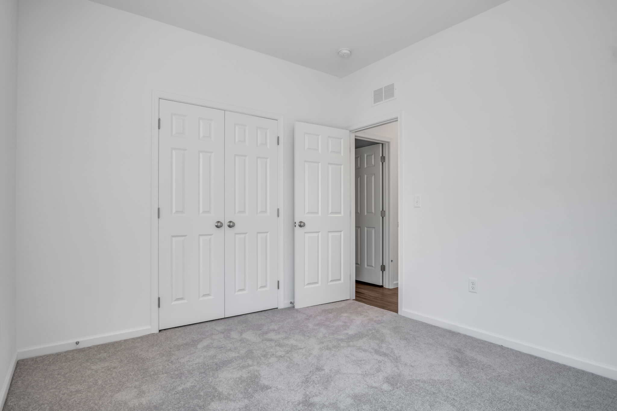 Empty Bedroom of the Tippet Model from Garman Builders