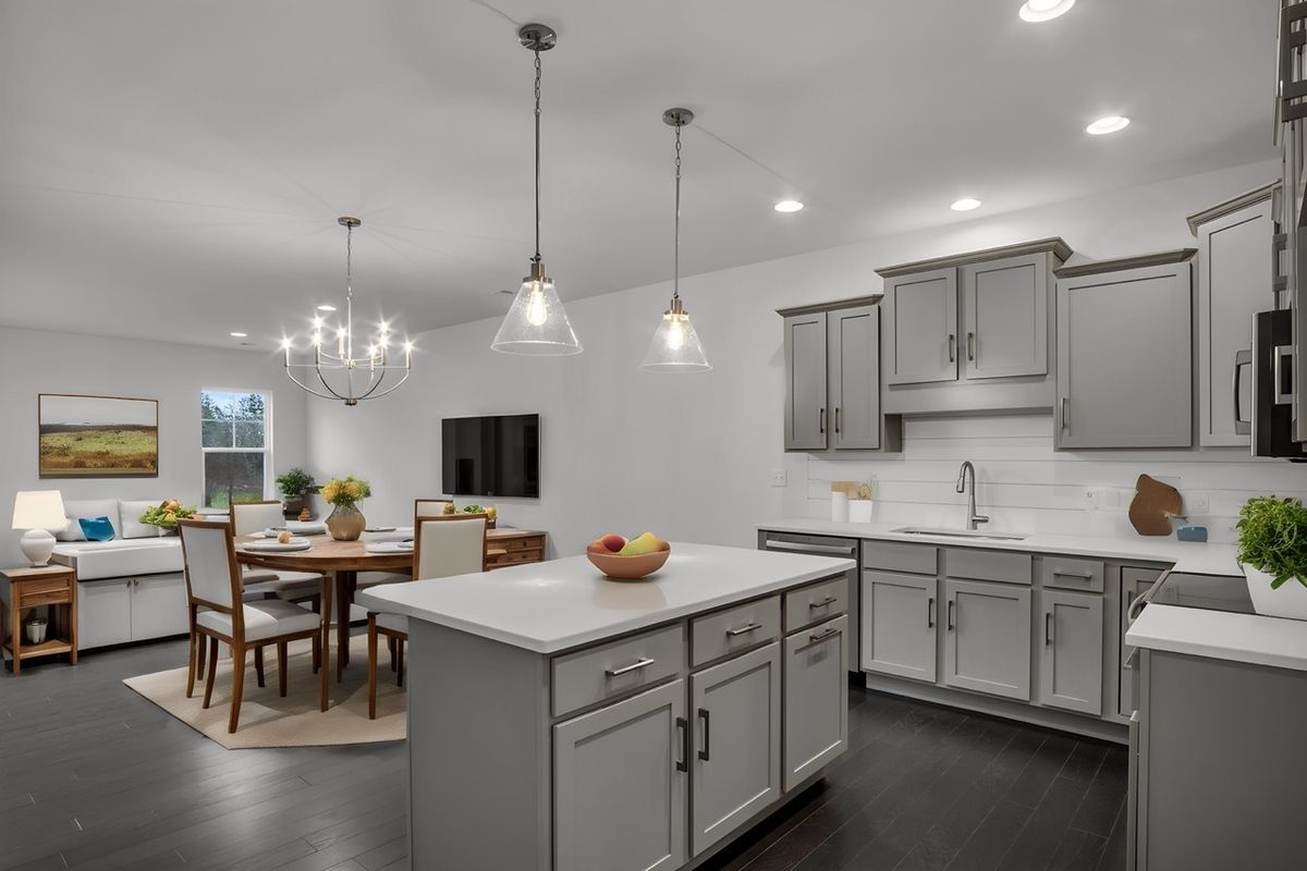 Kitchen with Center Island of the Griffin Model from Garman Builders