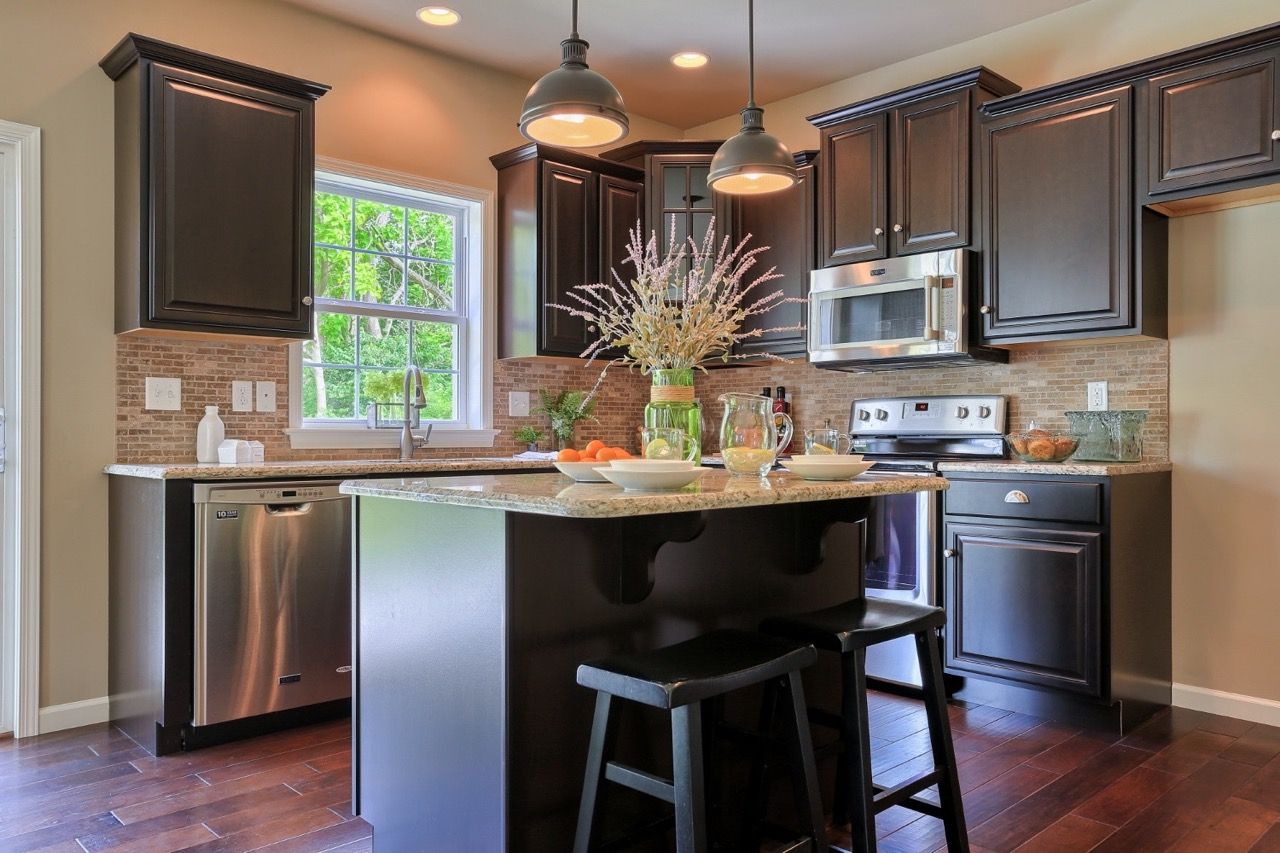 Kitchen with Center Island of the Sienna Model from Garman Builders