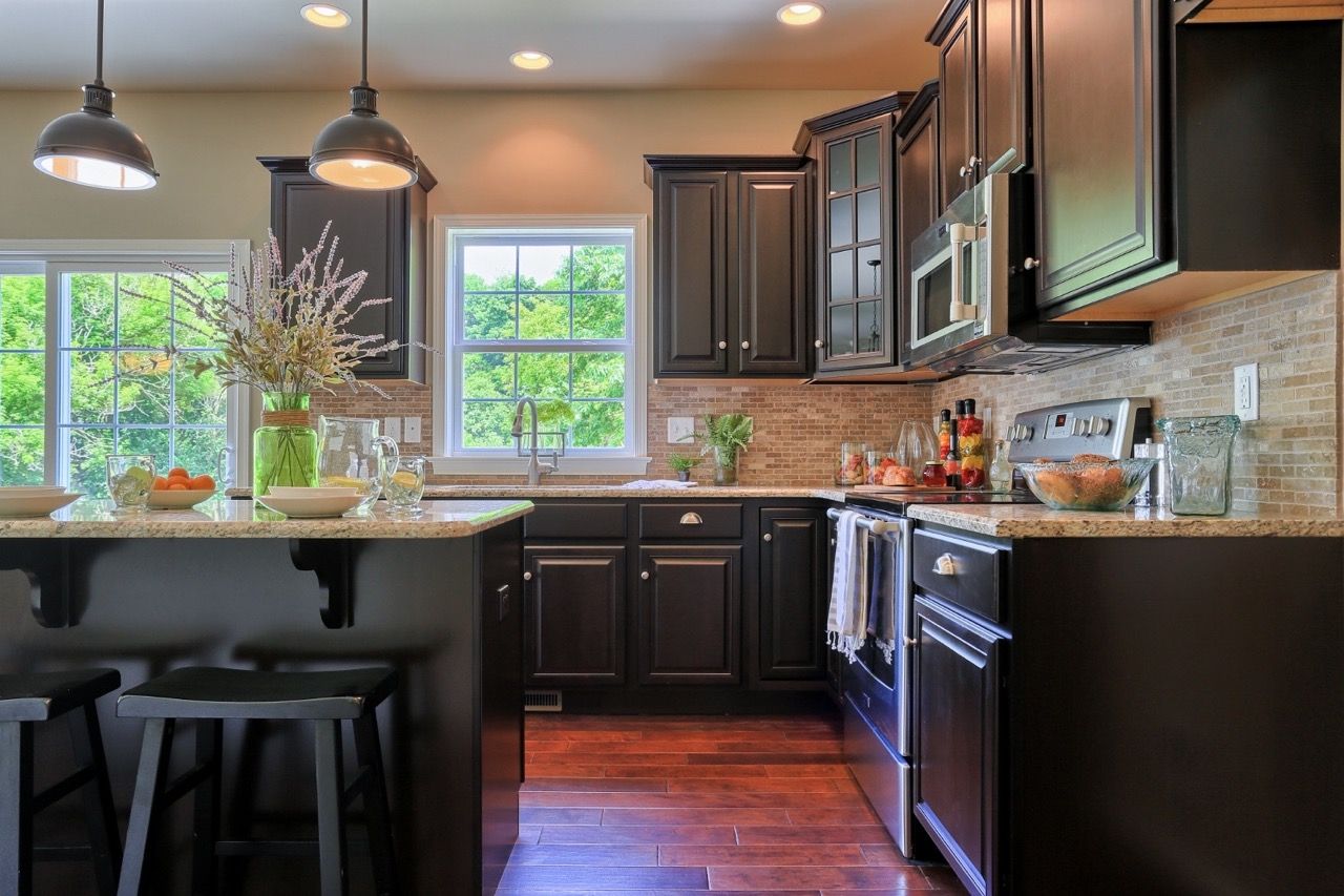 Kitchen with Center Island of the Sienna Model from Garman Builders