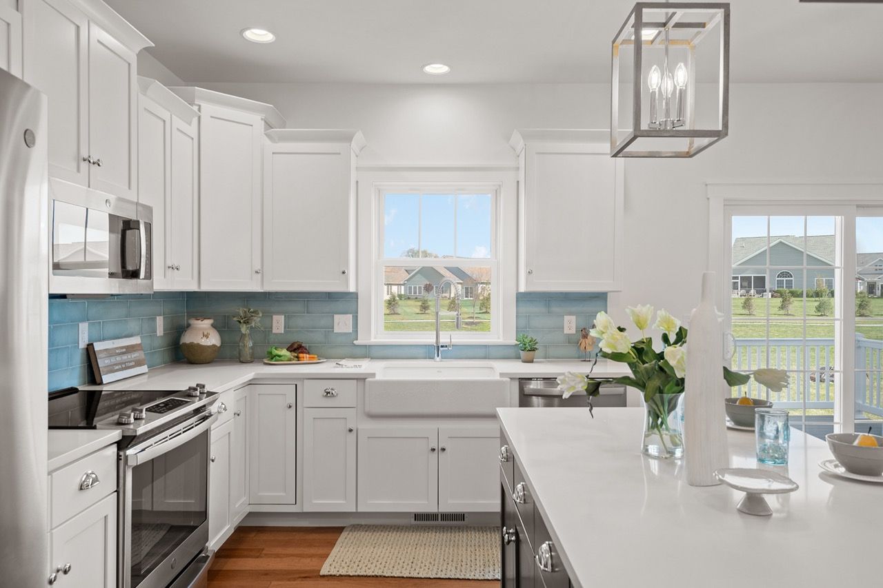 Kitchen with Center Island of the Mackenzie Model from Garman Builders