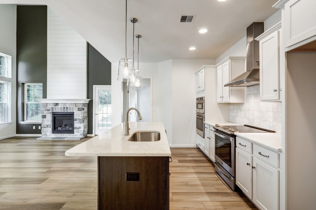 Kitchen with Center Island of the Sloane II Model from Garman Builders