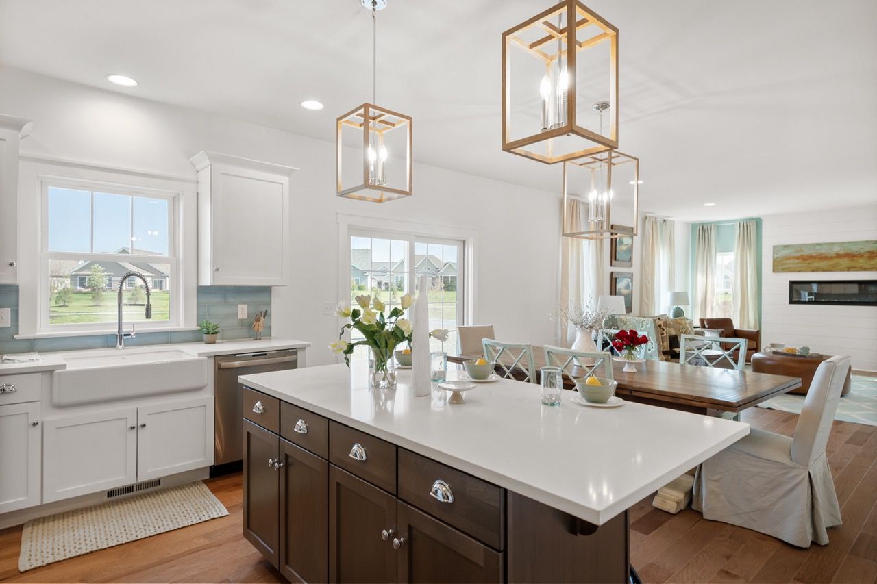 Kitchen with Center Island of the Mackenzie Model from Garman Builders