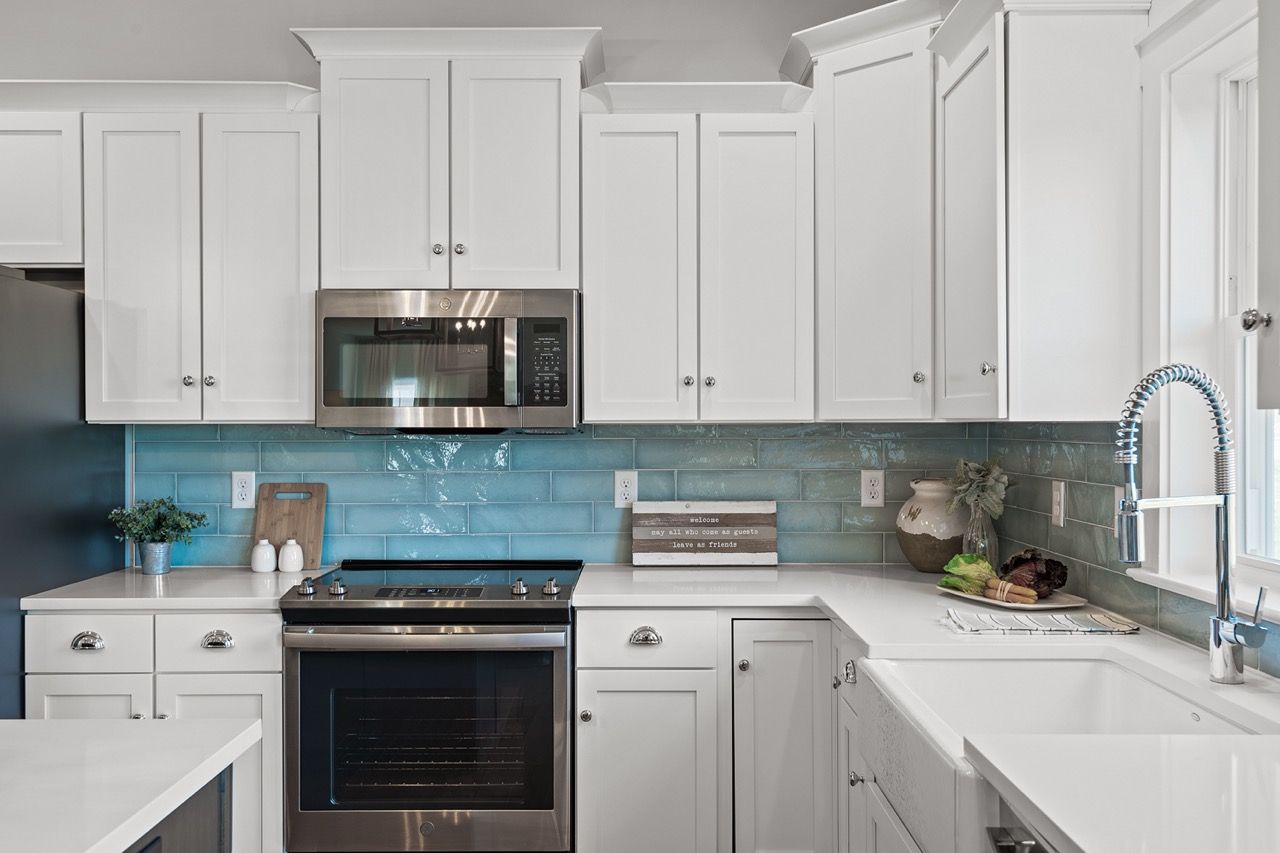 Kitchen with Center Island of the Mackenzie Model from Garman Builders