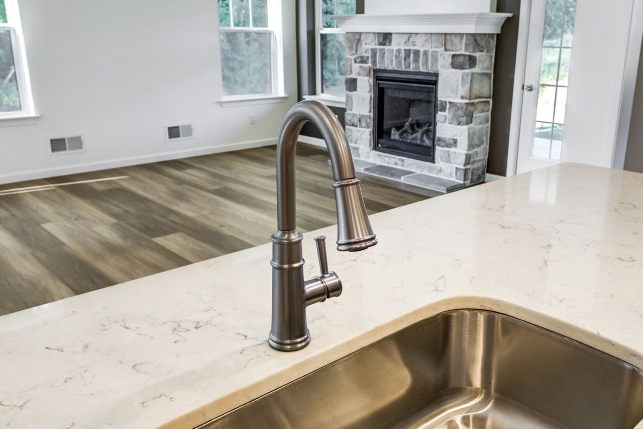 Kitchen with Center Island of the Sloane II Model from Garman Builders
