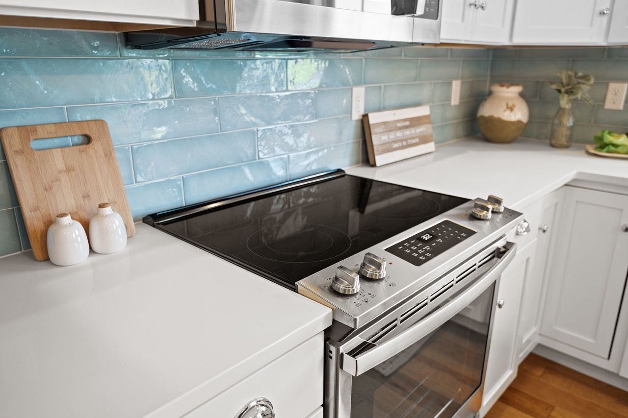 Kitchen with Center Island of the Mackenzie Model from Garman Builders