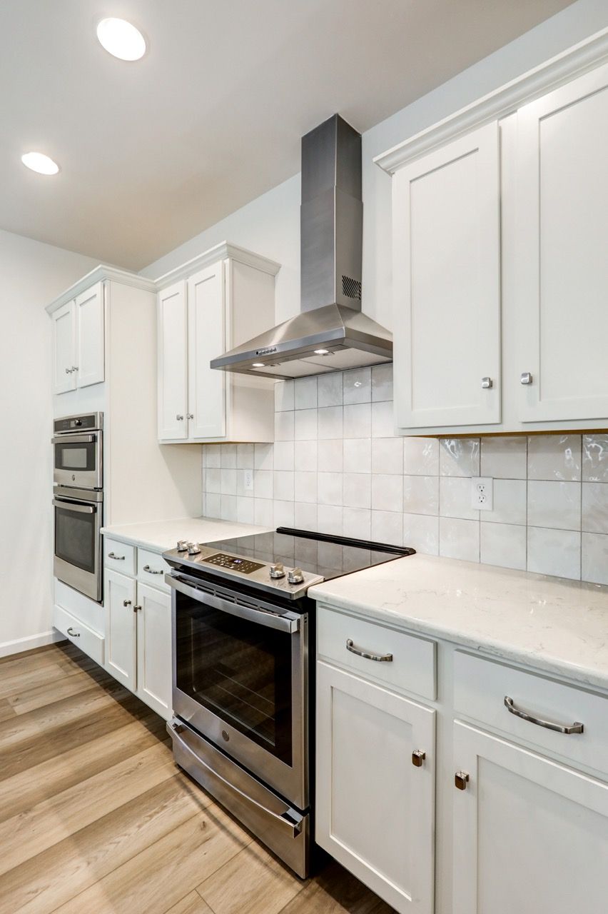 Kitchen with Center Island of the Sloane II Model from Garman Builders