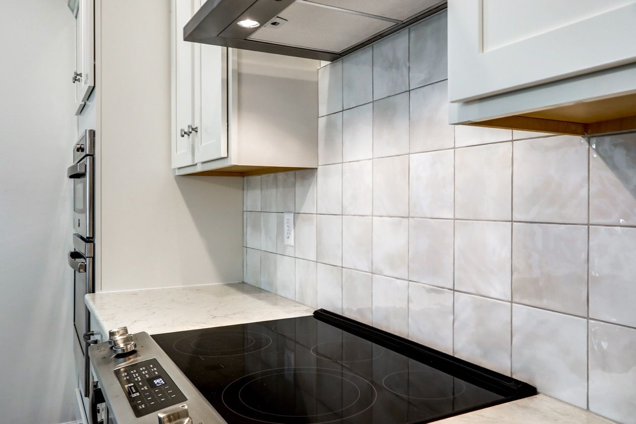Kitchen with Center Island of the Sloane II Model from Garman Builders