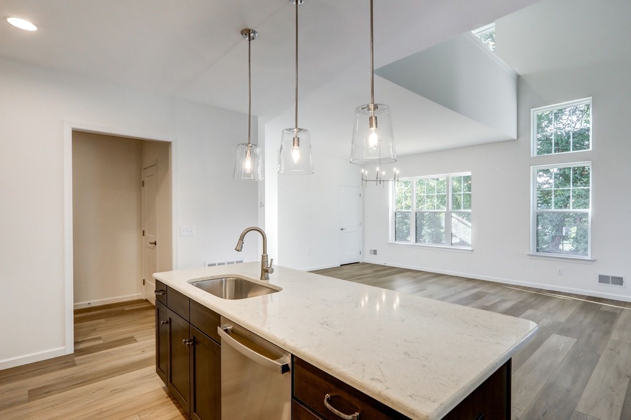Kitchen with Center Island of the Sloane II Model from Garman Builders