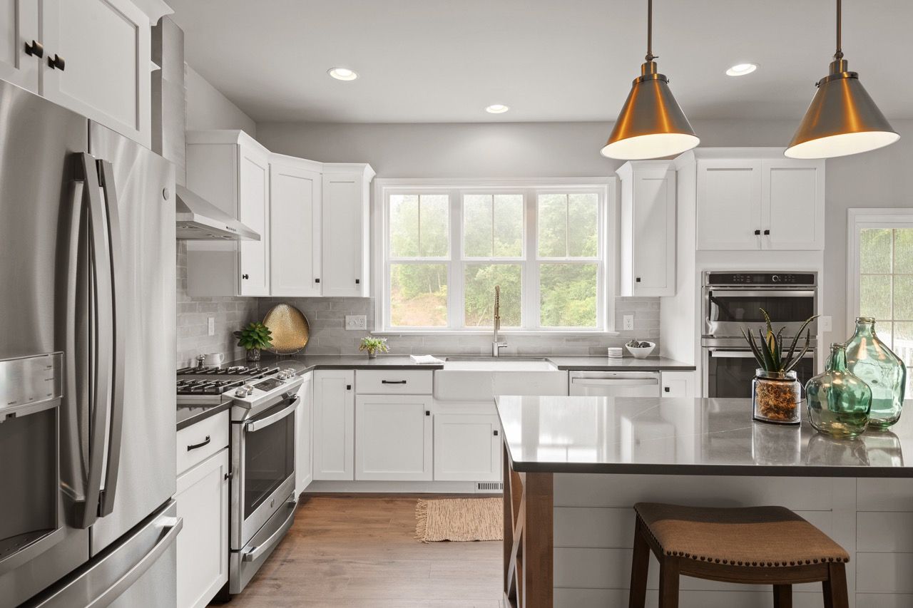 Kitchen with Center Island of the Nottingham Model from Garman Builders
