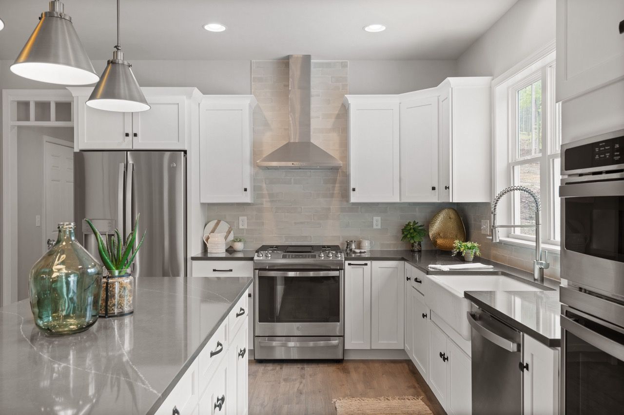 Kitchen with Center Island of the Nottingham Model from Garman Builders