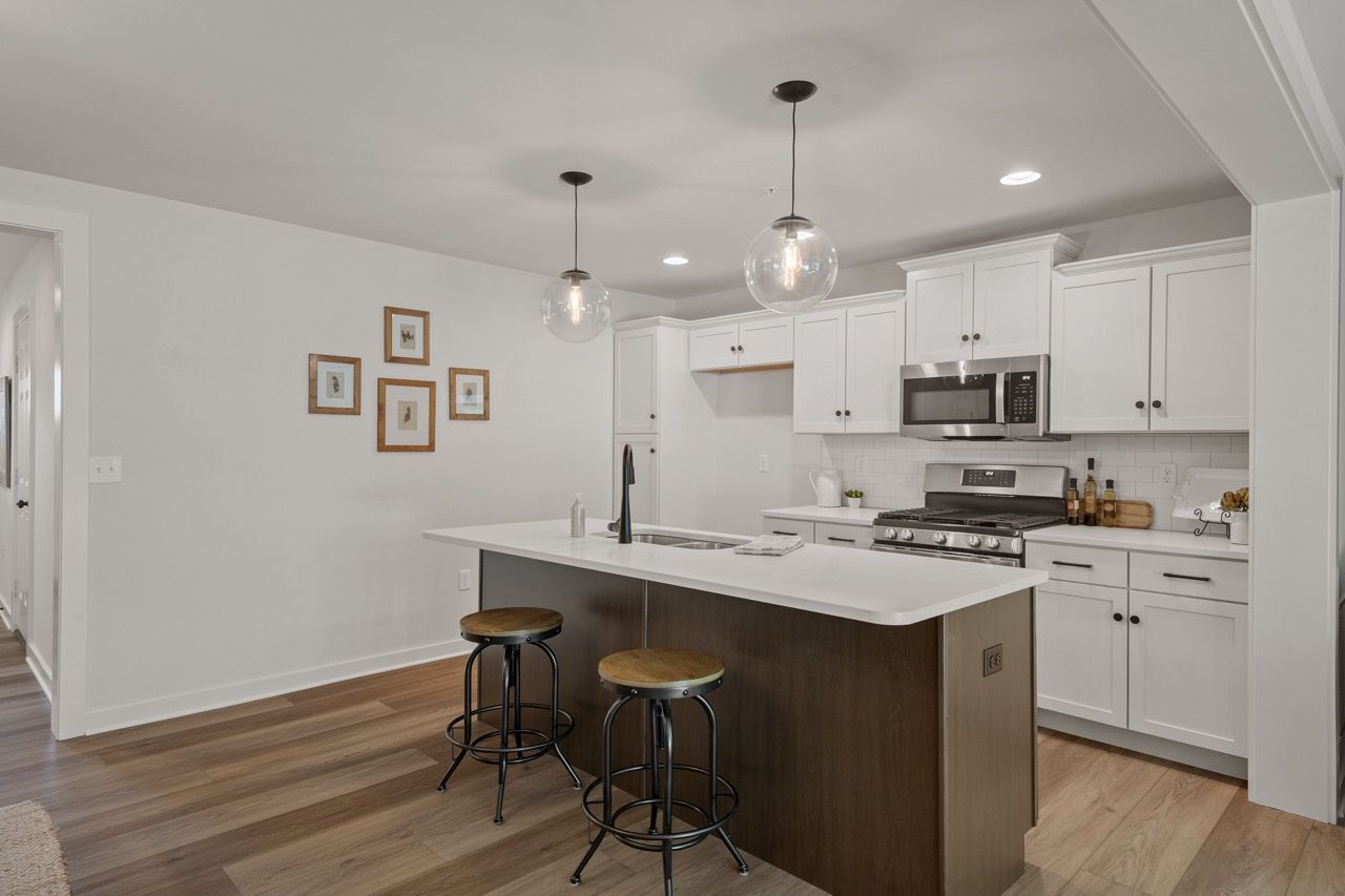 Kitchen with Center Island of the Flynn Model from Garman Builders