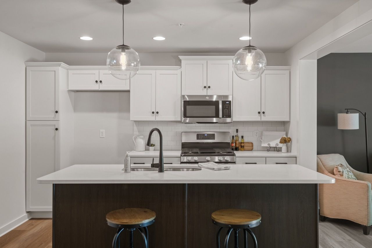 Kitchen with Center Island of the Flynn Model from Garman Builders