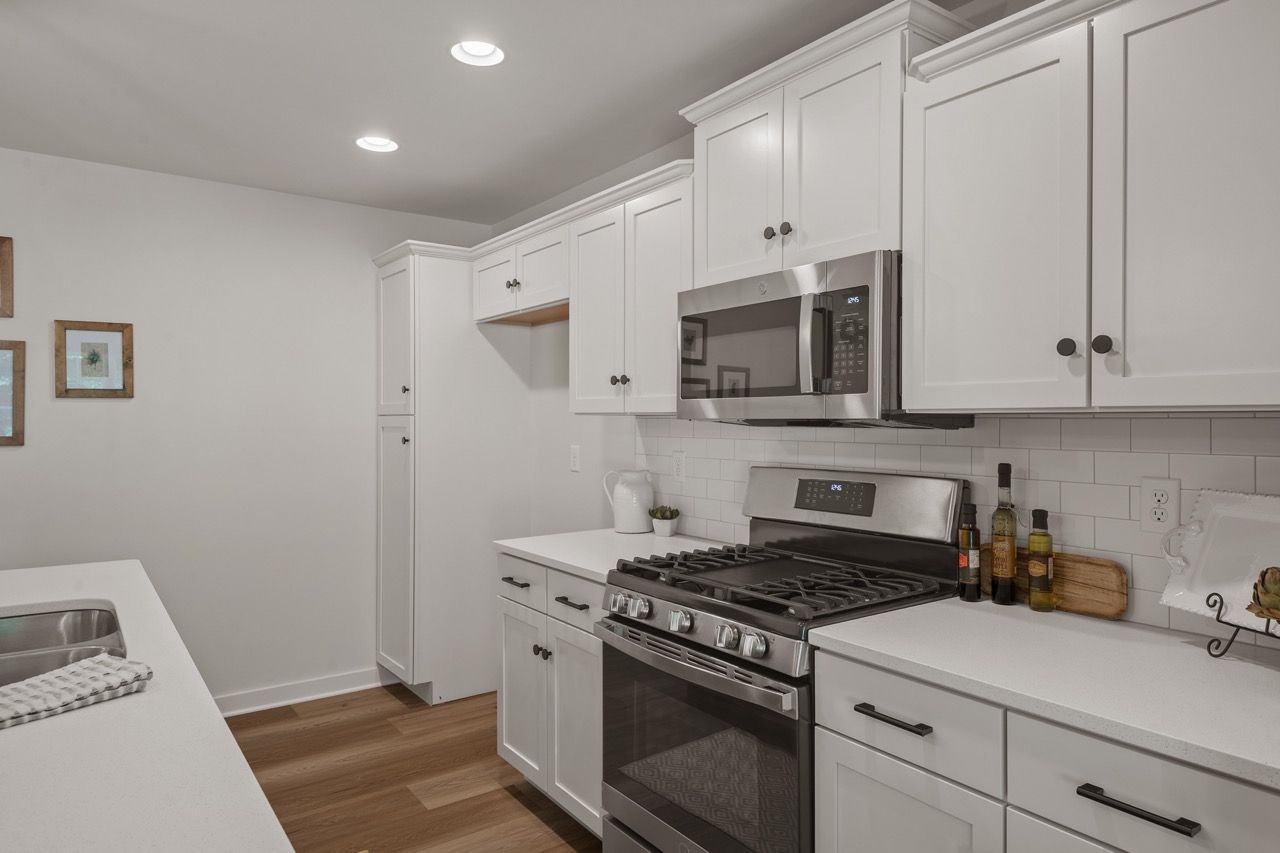 Kitchen with Center Island of the Flynn Model from Garman Builders
