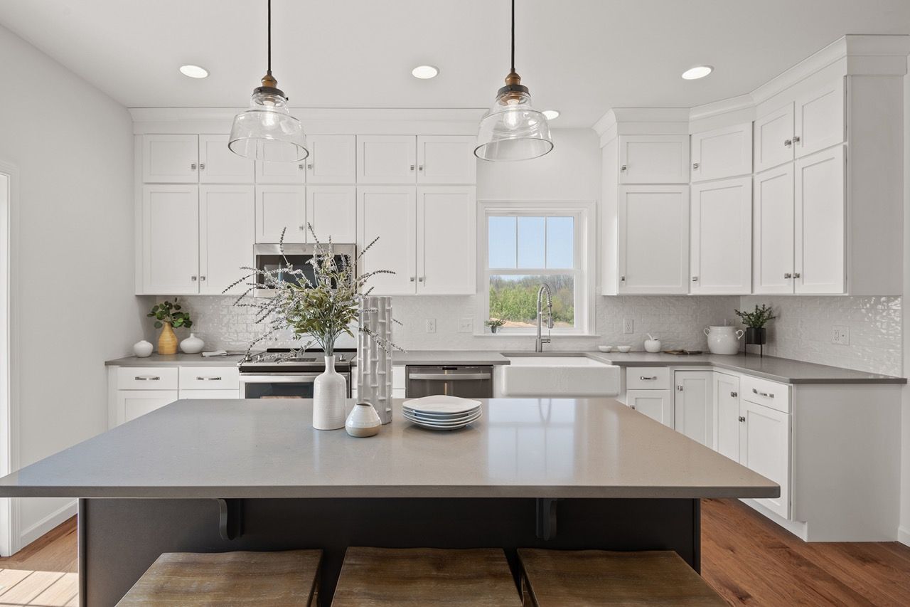 Kitchen with center island of the McKenna Model from Garman Builders