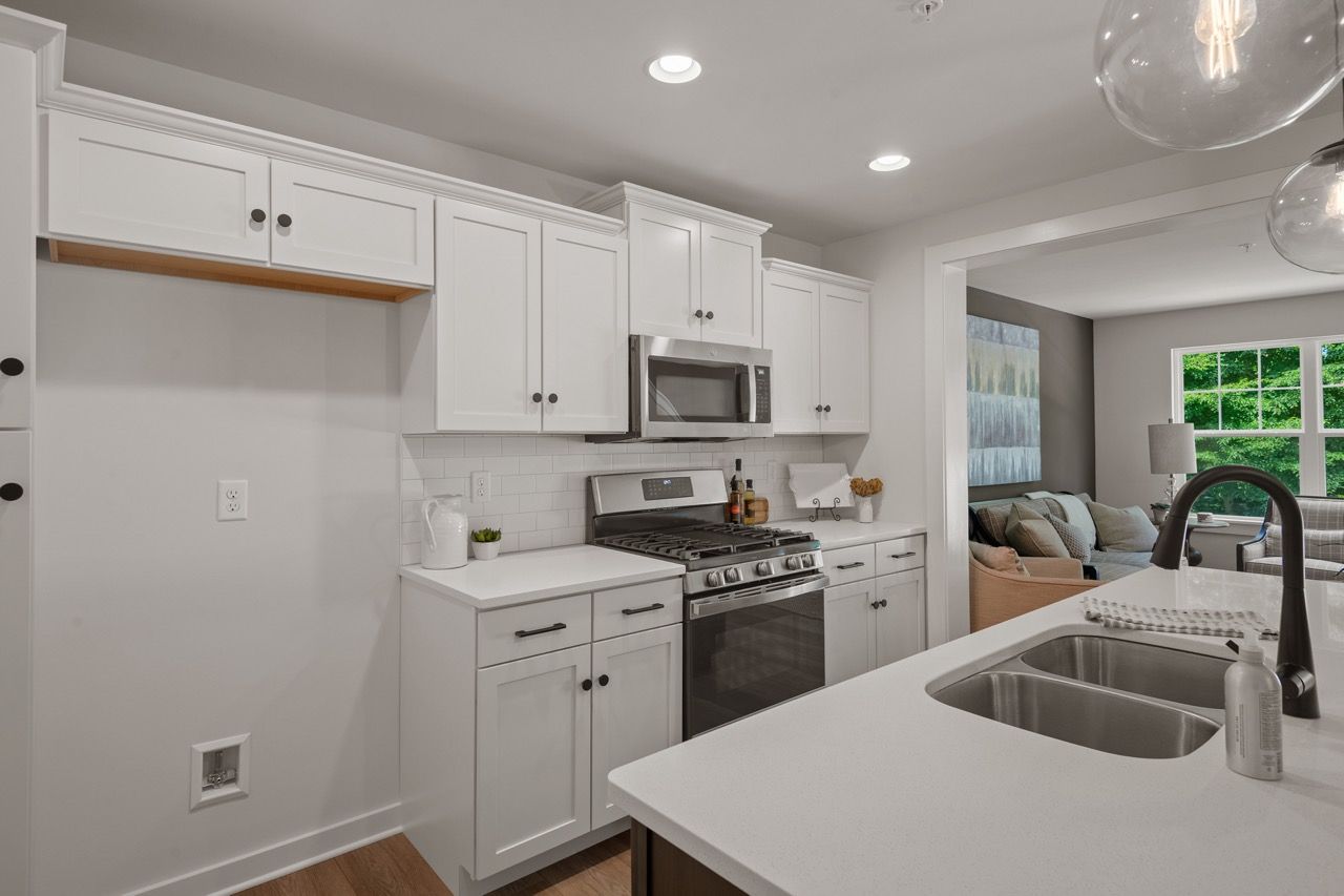 Kitchen with Center Island of the Flynn Model from Garman Builders