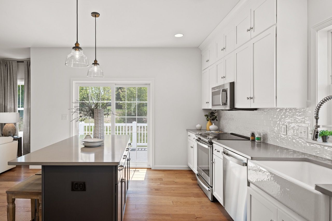 Kitchen with center island of the McKenna Model from Garman Builders
