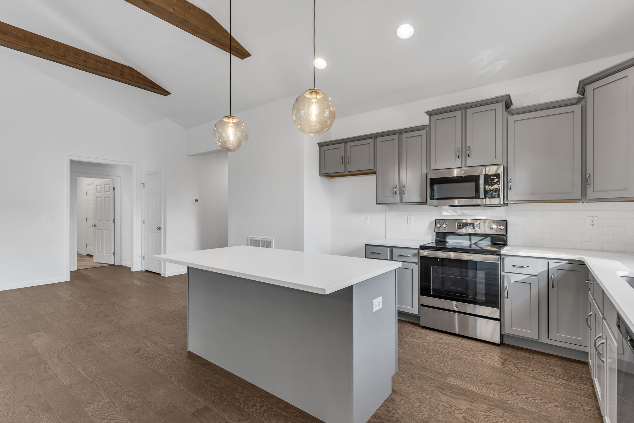 Kitchen with center island of the Dalton Model from Garman Builders