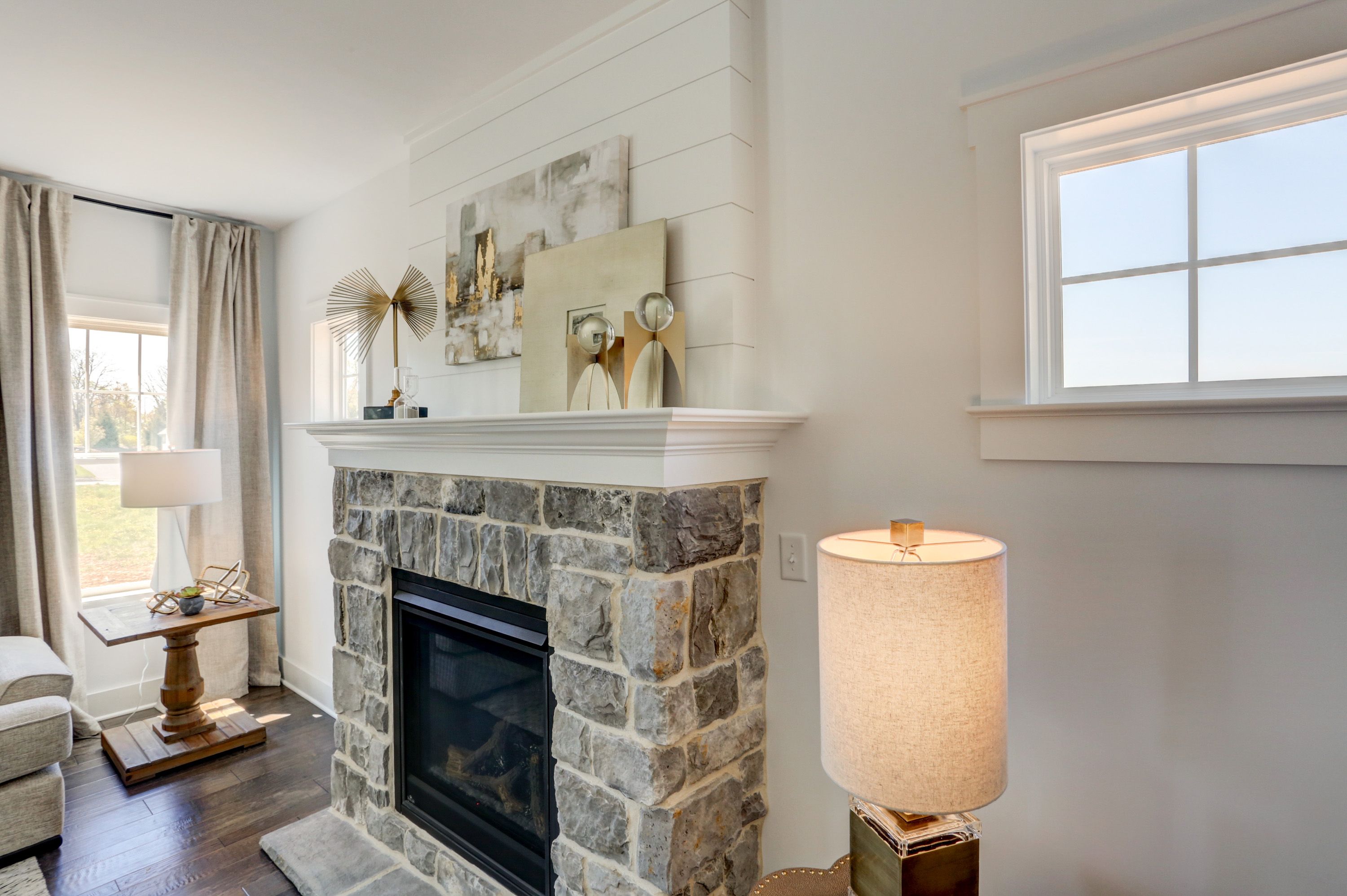 Living room with fireplace in the Avondale model from Garman Builders